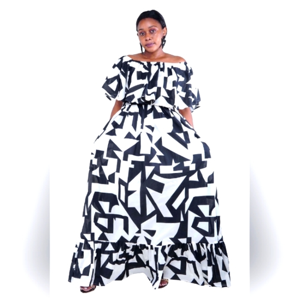 Black and white geometric Flair maxi flowing dress with matching earrings